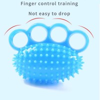 Manufacturer wholesales high quality TPR environmental protection 4-finger fitness needle ball palm training rehabilitation ball